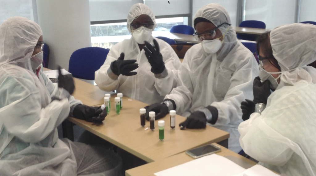 Students examine fluid samples